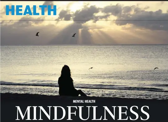  ?? LYNNE SLADKY AP ?? A woman meditates on the beach in Miami Beach in 2010.
According to a study published Wednesday in the journal JAMA Psychiatry, mindfulnes­s meditation worked as well as a standard drug for treating anxiety in the first head-to-head comparison.