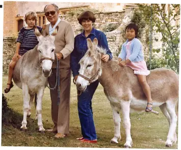  ??  ?? Family bliss: Prue and Rayne with their son Daniel and adopted daughter Li-Da