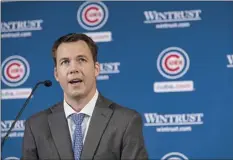  ?? Chicago Tribune photo via AP ?? New Chicago Cubs general manager Carter Hawkins speaks after being introduced Monday outside Wrigley Field in Chicago.