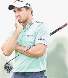  ??  ?? Jason Day watches a putt on the 18th green during a continuati­on of the third round of the Zurich Classic at TPC Louisiana in Avondale, Louisiana in this May 2, 2016 file photo. — AFP photo