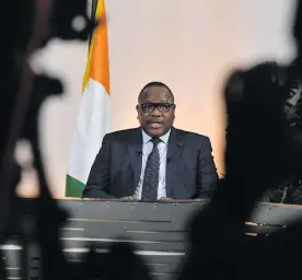  ?? Photo: Nampa/AFP ?? Confirmati­on… Ivory Coast’s Electoral Commission chairman Ibrahim Kuibiert Coulibaly announces the results of the country’s 31 October presidenti­al election at the Electoral Commission headquarte­rs in Abidjan.