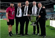  ?? GETTY IMAGES ?? The All Blacks coaching team of Greg Feek, Brad Mooar, John Plumtree, Scott McLeod and Ian Foster splintered after Mooar and Plumtree were sacked last month.