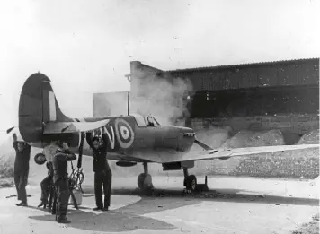  ?? ?? A Supermarin­e Spitfire fighter being readied for action during the Battle of Britain.