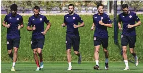  ?? ?? Tunisia players take part in a training session at the Al Egla training facility in Doha, yesterday.