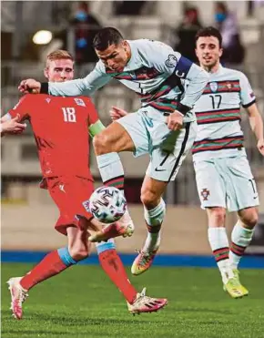  ?? EPA PIC ?? Portugal’s Cristiano Ronaldo (centre) scores against Luxembourg in their World Cup qualifier at Josy Barthel Stadium in Luxembourg on Tuesday.