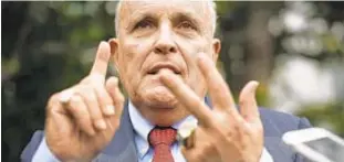  ?? ALEX WONG / GETTY IMAGES ?? Rudy Giuliani, former New York City mayor, current lawyer for President Donald Trump.