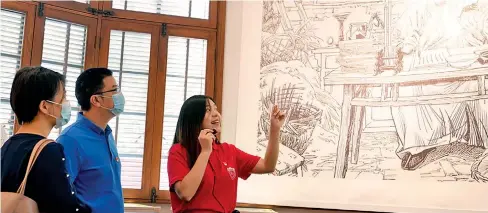  ?? Photo: Xinhua ?? Lu Tingting (R), a member of volunteer team of Party members, works at an exhibition hall of the Communist Manifesto at Fudan University in Shanghai, east China, June 30, 2020.