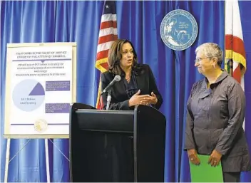  ?? ERIC RISBERG AP FILE ?? Then-California Attorney General Kamala Harris (left) pays tribute to Mary Nichols in 2016. Nichols’ term as chair of the California Air Resources Board ends in December.