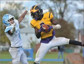  ?? KYLE FRANKO — TRENTONIAN PHOTO ?? Nottingham defensive back Quiyon McMillan (3) intercepts the ball in front of Notre Dame wide receiver Marcus Peterson in the end zone during a WFJL game at Jim Wilno Sr. Field in Hamilton. McMillan is the first Northstar to win the Mammy Award since 2013.