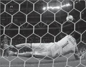  ?? The Associated Press ?? SAVING GRACE: Chilean goalkeeper Claudio Bravo make a save against Portugal in the shootout of the Confederat­ions Cup semifinal match Wednesday in Kazan, Russia. Chile outscored Portugal 3-0 in the shootout for a spot in Sunday’s title match against...