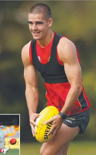  ?? Main picture: AFL MEDIA ?? Jacob Dawson at Suns training and (inset) playing for Palm Beach Currumbin High in his school days.