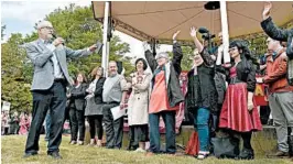  ?? OLI SCARFF/GETTY-AFP ?? Labour Party leader Jeremy Corbyn, left, said “it would be reasonable to have a public vote” on any Brexit package, including one put forth by his party.