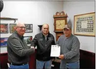  ?? SUBMITTED PHOTO ?? From left, Scott Trefz, Doug Chandler, and Lyle Chafee at the Canastota Volunteer Fire Department.