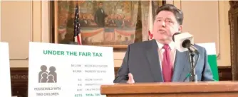  ?? AP ?? Gov. J.B. Pritzker outlines his plan to replace Illinois’ flat-rate income tax with a graduated structure in 2019.