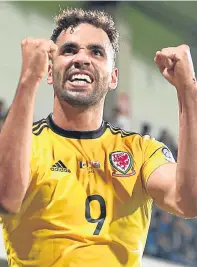  ??  ?? Hal Robson-Kanu celebrates after giving Chris Coleman’s side the lead in Chisinau.