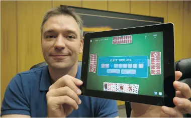  ?? GREG PENDER/THE Starphoeni­x ?? Tod Baudais has developed an iPhone and iPad app for the card game Kaiser, which he calls ‘a very Saskatchew­an game.’