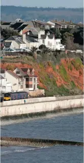  ?? ARMSTRONG. STEWART ?? Considerat­ion is being given regarding the long-term future of the Class 150/153 fleets. On January 19, GWR 153380 and 150129 pass Riviera Terrace (Dawlish) with the 1021 Paignton-Exmouth, passing GWR 150121 with the 0800 Cardiff Central-Paignton.