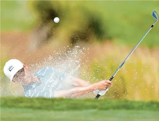  ?? LYNNE SLADKY/AP ?? Justin Suh hits from a bunker during the third round of the Honda Classic, where he was the 54-hole leader.