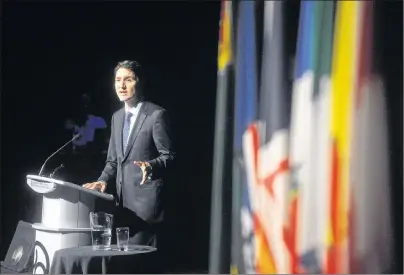  ?? CP PHOTO ?? Prime Minister Justin Trudeau speaks as the 2017 Symons Lecturer at the Confederat­ion Centre of the Arts in Charlottet­own, P.E.I., on Thursday.