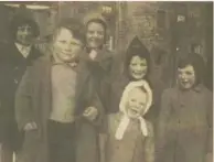  ??  ?? Dean Village children playing in the snow at the Auld Ducks, Damside, Dean Village 1947 CAPTION Children playing in the snow in theDean Village 1947