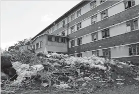  ??  ?? A heap of uncollecte­d garbage outside Vundu Flats in Makokoba suburb, Bulawayo. The garbage poses a health risk to residents