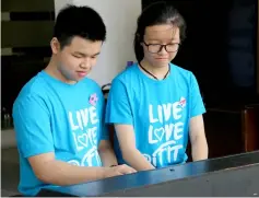  ??  ?? Bryan and Alicia jointly perform on World Autism Awareness Day.