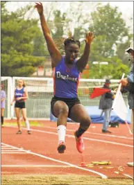  ?? Christian Abraham / Hearst Connecticu­t Media ?? Danbury’s Ariel Williams competes in the long jump in the Class LL championsh­ips Wednesday.