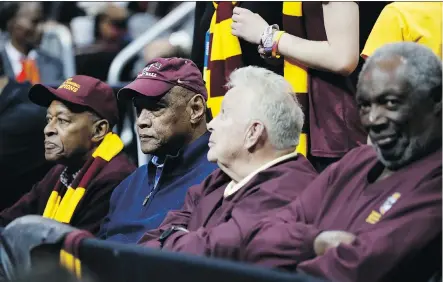  ?? DAVID GOLDMAN/THE ASSOCIATED PRESS ?? Members of the 1963 Loyola-Chicago NCAA championsh­ip team — Jerry Harkness, Les Hunter, John Egan and Rich Rochelle — are cheering on this year’s club as it makes its own appearance in the Final Four 55 years after the Ramblers first made their mark.