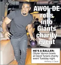  ??  ?? HE’S A BALLER: Olivier Vernon bowls at David Tyree’s charity event Tuesday night.