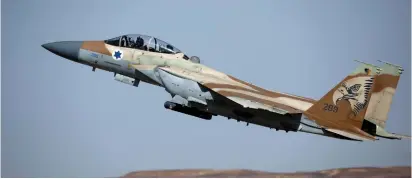  ?? (Amir Cohen/Reuters) ?? AN ISRAELI F-15 fighter jet takes off in May.