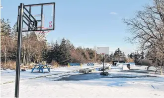  ?? KATHY JOHNSO ?? A light dusting of snow covers the ground at the Barrington Leisure Park under developmen­t in Barrington Passage. Clark’s Harbour businessma­n Fenton Cunningham and his wife Linda recently donated a parcel of land that borders the park property at the rear, near the Barrington Bay multi-use trail that runs through the community.