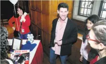  ?? Arnold Gold / New Haven Register 2014 ?? Craig Breslow, then a lefty reliever with the champion Red Sox, meets with fans at Yale Law School in January 2014.