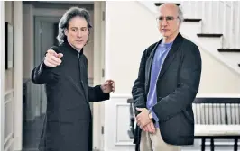  ?? ?? Lewis, left, having a vigorous discussion with Larry David in a scene from Curb Your Enthusiasm