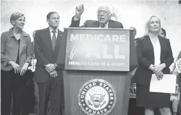  ??  ?? Sanders speaks on health care as Warren, Senator Richard Blumenthal and Gillibrand listen during an event on Capitol Hill in Washington, DC. — AFP photo