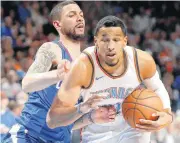  ?? [PHOTO BY BRYAN TERRY, THE OKLAHOMAN ARCHIVES] ?? Oklahoma City’s Andre Roberson, shown going past LA Clippers’ Austin Rivers last Nov. 10, likes the idea of the Thunder playing and thinking faster.