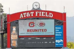  ?? STAFF PHOTO BY DOUG STRICKLAND ?? The video board displays a message announcing the renewed partnershi­p between the Chattanoog­a Lookouts and the Cincinnati Reds held at AT&amp;T Stadium on Tuesday.