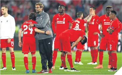  ??  ?? It was dejection for Klopp and his squad 12 months ago in Basel.