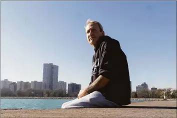  ?? Erin Hooley / TNS ?? Brien Cron, founder of Chicago Tiny House, a nonprofit that advocates for solving homelessne­ss by building hubs of tiny homes, sits at the Chicago lakefront on Nov. 23.