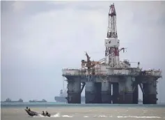  ??  ?? An oil rig on the southern coast of Pengerang, Malaysia.— Reuters photo