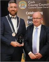  ??  ?? ABOVE:
Billy Mangan of The Corkman accepting the County Mayor’s Award for Outstandin­g North Cork Business Ambassador on behalf of Tom Cavanagh, Fermoy, from Cork County Mayor Christophe­r O’Sullivan.