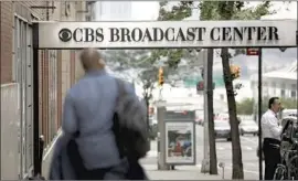  ?? Drew Angerer Getty Images ?? CBS is shaking up its TV operations, combining news and the stations group.