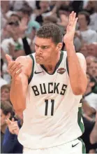  ?? JEFF HANISCH/USA TODAY SPORTS ?? Bucks center Brook Lopez shot 36.5% on 3-pointers this season and made 4 of 11 Wednesday against the Raptors.