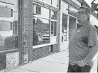  ?? ED SEMMLER/SOUTH BEND TRIBUNE ?? Richard Murphy stands by the portion of the Redden Building along Days Avenue that will be converted into a restaurant called Thistledow­n.