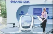  ??  ?? Guangzhou Ehang Intelligen­t Technology showcases its passenger-carrying Ehang 184 drone during the forum.