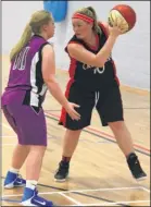  ??  ?? Danielle Muckian being guarded by Molly Eyles