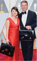  ??  ?? It’s a big day for PwC beancounte­rs Martha Ruiz and Brian Cullinan who scored the most glamorous job in accountanc­y: running the Oscars vote.
Each year, the duo send out 7,000 ballot papers, supervise the counting system, and help oversee the...