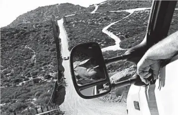  ?? JOHN GASTALDO/FOR THE LOS ANGELES TIMES ?? Robert “Little Dog” Crooks, of Las Vegas, is one of several minutemen patrolling the U.S.-Mexico border near Campo, Calif.