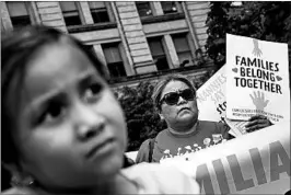  ?? DREW ANGERER/GETTY ?? Activists and children protest against U.S. immigratio­n policies Wednesday in New York.