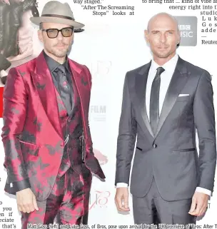  ?? — AFP photo ?? Matt Goss (left) and Luke Goss, of Bros, pose upon arrival for the UK premiere of ‘Bros: After The Screaming Stops’ during the BFI London Film Festival in London on Wednesday.