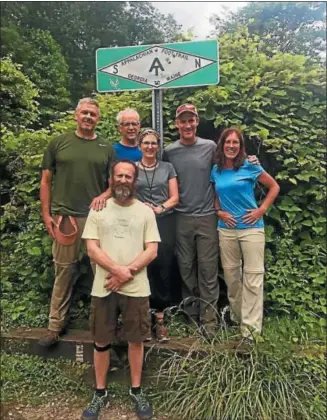  ?? PHOTO COURTESY OF TOM WARREN ?? Hiking the Appalachia­n Trail last spring are, front, Howard Stein, and behind him, left to right, Scott Hicks, Tom Warren, Kim Miller, Paul Brewer, and Amy Jo Ernenwein. They are back on the trail starting this weekend.